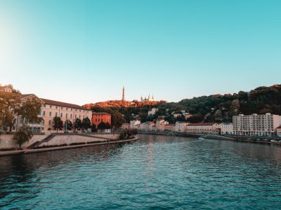 body of water under blue sky